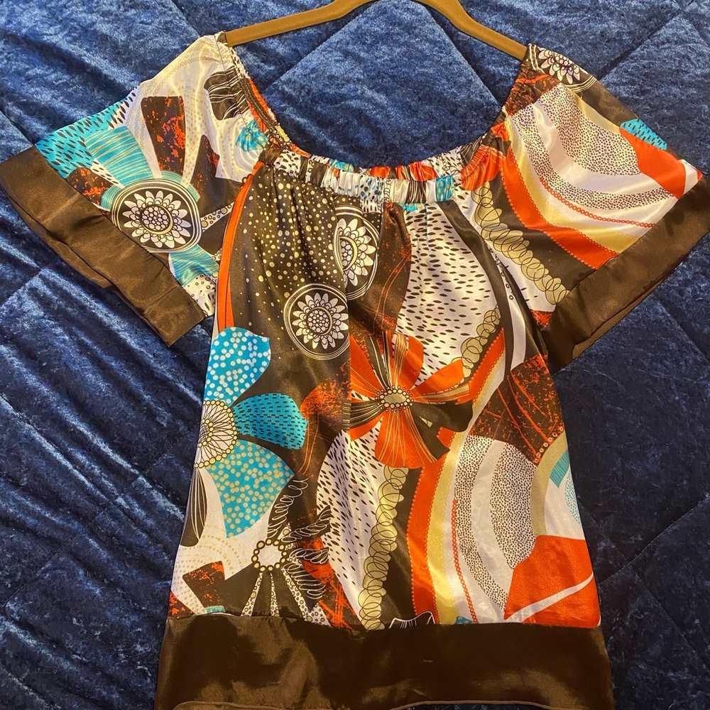 Women’s multi color Takara brand Size M short sleeve shirt